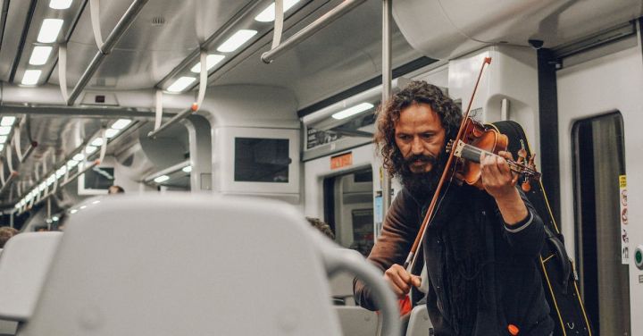 Train Music - Man Playing Violin Inside Train