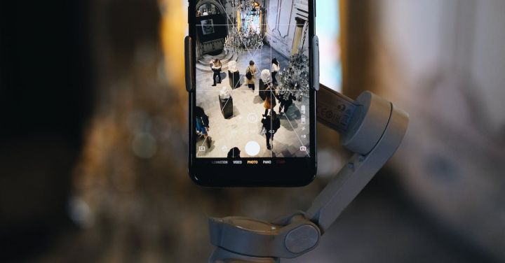 Technology - A Person Holding a Gimbal with an Attached Smartphone