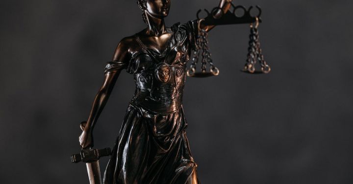 Bankruptcy Lawyer - Close-up Photo of a Lady Justice Statuette