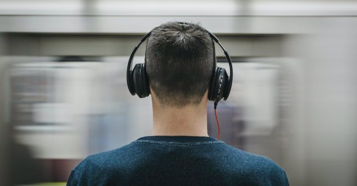 Train Music - Man Wearing Headphones