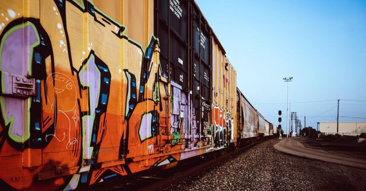 Train Art - Containers with colorful graffiti drawings